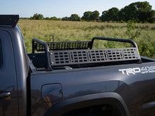 Load image into Gallery viewer, Overland Bed Bars on a Toyota Tacoma