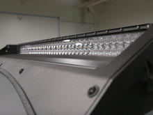 Load image into Gallery viewer, Close up of exposed LED light bar on Premium roof rack - Cali Raised LED