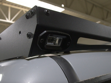 Load image into Gallery viewer, Close up of rear podlight on Premium roof rack - Cali Raised LED