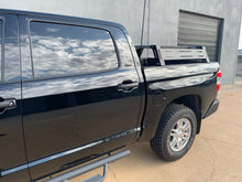 Load image into Gallery viewer, Drivers side angled view of black Toyota Tundra with Overland Bed Rack - Cali Raised LED