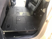 Load image into Gallery viewer, Toyota Tacoma 2005-Present 2nd and 3rd Gen. Double Cab - Second Row Seat Delete Plate System keeping Factory Back Wall
